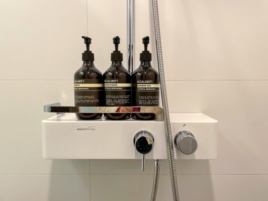 soap and shampoo dispenser in hotel shower